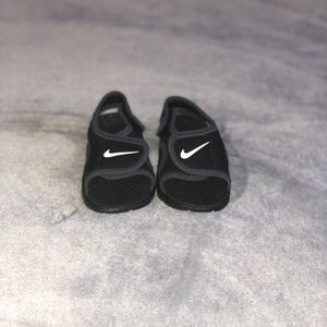 Never worn infant Nick slippers